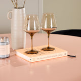 Stůl Lanzo – broskev se 4 židlemi Edina – černá