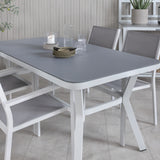 Jídelní stůl Virya - bílá Alu / šedé sklo - malý stůl + stohovací židle Copacabana - bílá/šedá_4