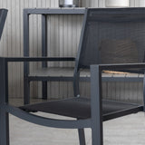 Jídelní stůl Virya - černý Alu / šedé sklo - velký stůl + stohovací židle Copacabana - Black/Black_6