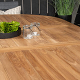 Kenya Oválný jídelní stůl 180/240*120*H75 -Teak - Ersätter 9525-444 +Židle na úrovně (stohovatelné) - Black Alu / Black Aintwood _8