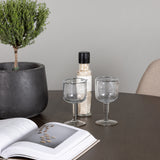 Jídelní stůl Kaseidon - kulatý - kaučukové dřevo / tmavě hnědá MDF + jídelní židle Polar - černá / béžová Boucle _4