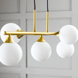 Závěsná lampa Orb, mosazní barva