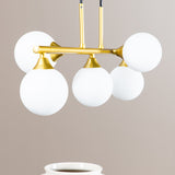 Závěsná lampa Orb, mosazní barva